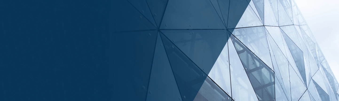 Glass building panels symbolizing structure and transparency in administrative health care law compliance